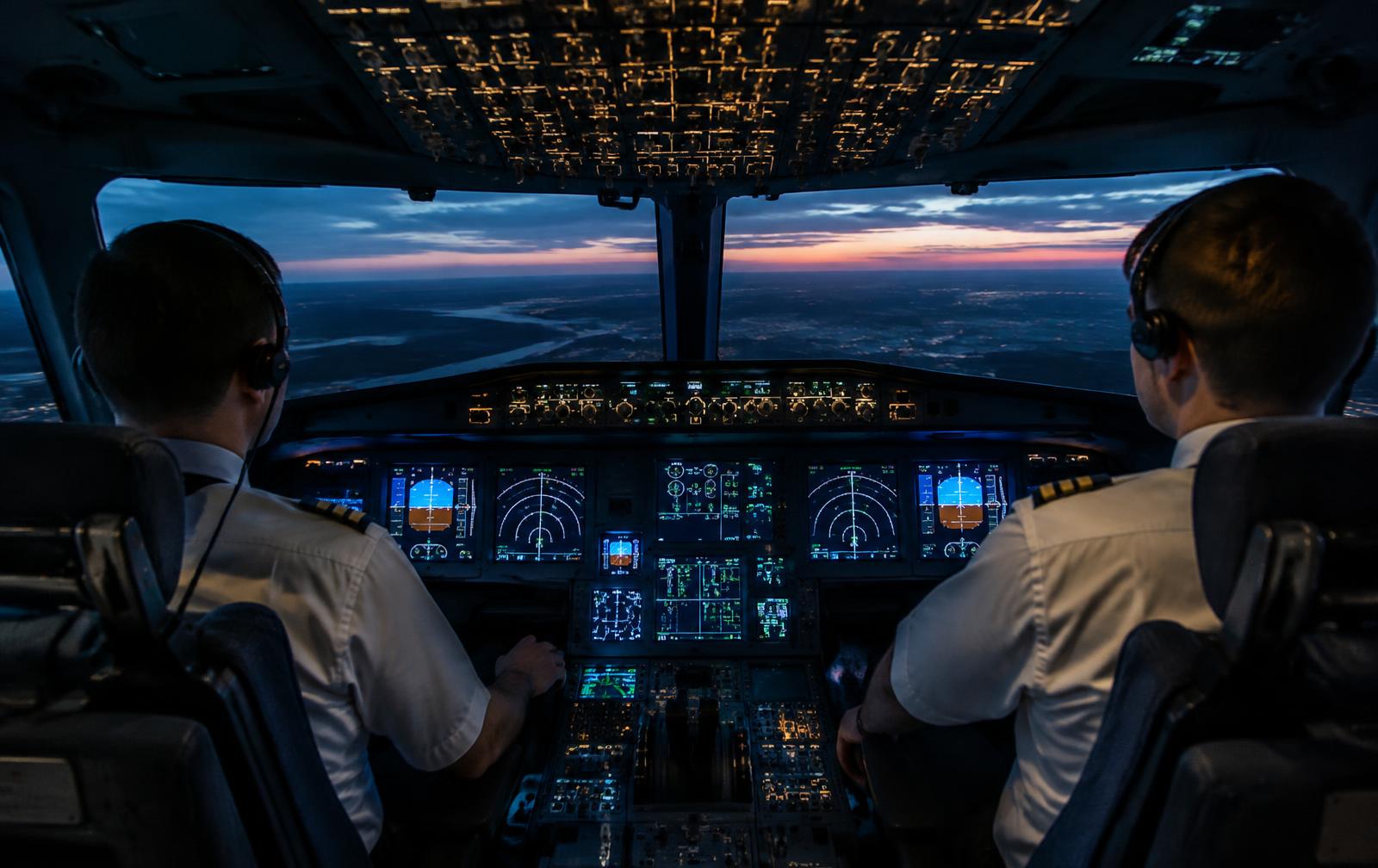 Pilots in an airliner flight deck